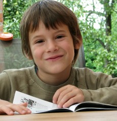 boy enjoying reading